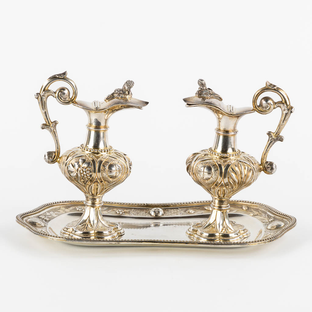 Joseph Dejean, Paris, a pair of wine and water cruets, silver, 1846-1865. 650g. (L:15 x W:26 x H:15 cm)