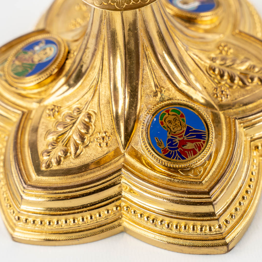 A Gothic Revival chalice with enamel plaques, cabochons. Silver Cuppa, Gilt brass, 19th C.