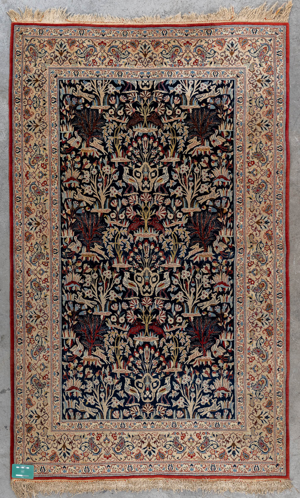 An Oriental hand-made carpet, birds and trees, Isphahan/Isfahan. (L:181 x W:107 cm)