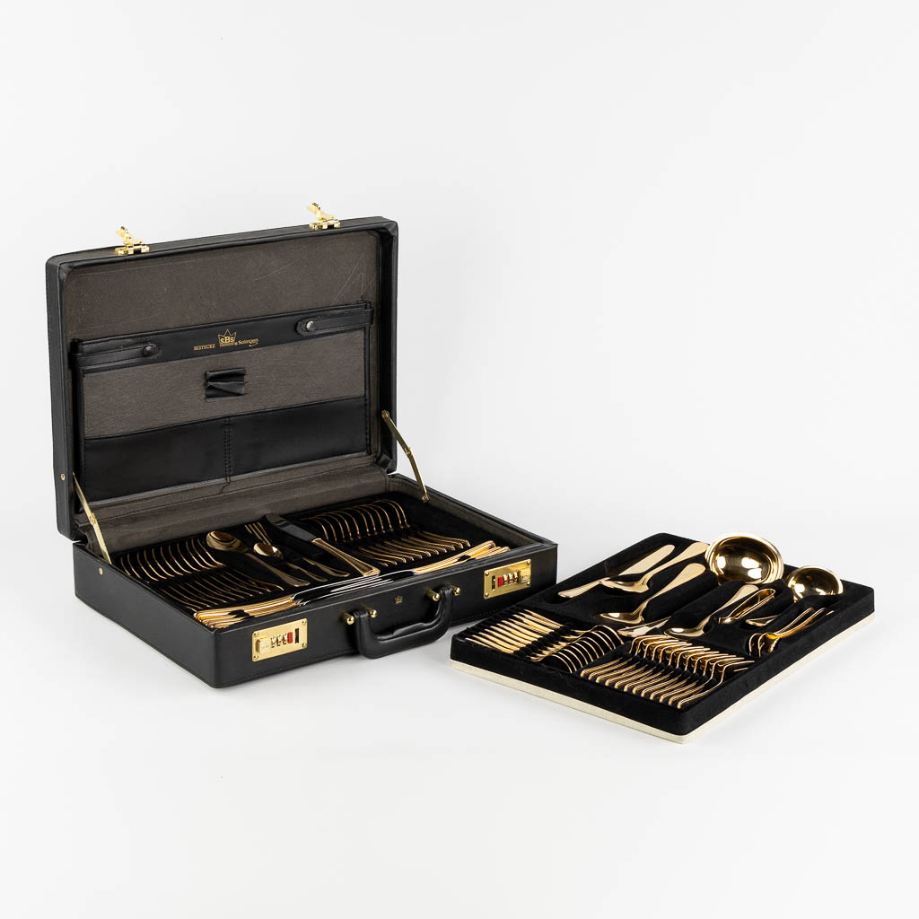 A gold-plated 'SBS' flatware cutlery set, made in Germany. (L:36 x W:45 x H:10 cm)