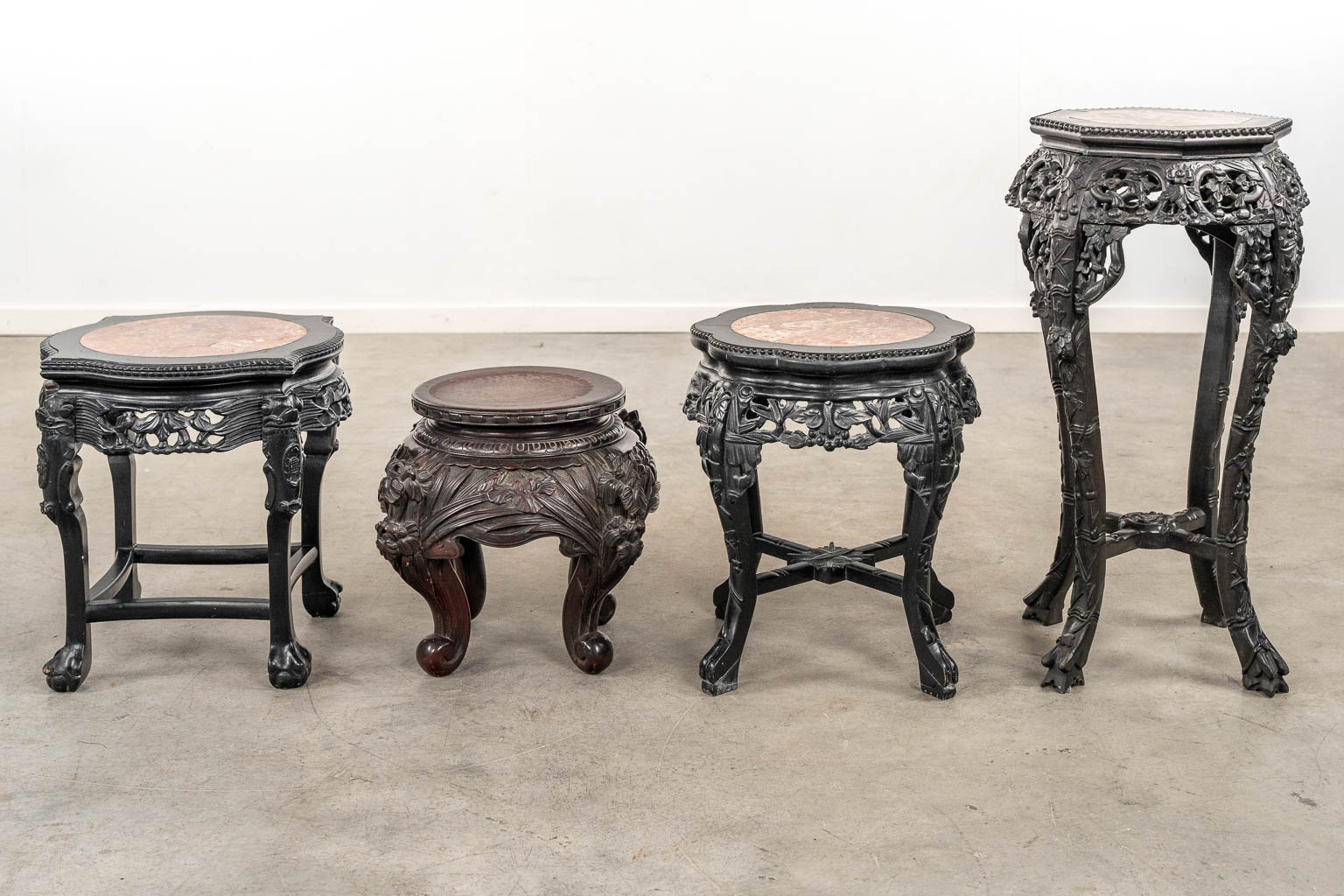 Four Chinese sculptured hardwood pedestals. (H:77 x D:43 cm)