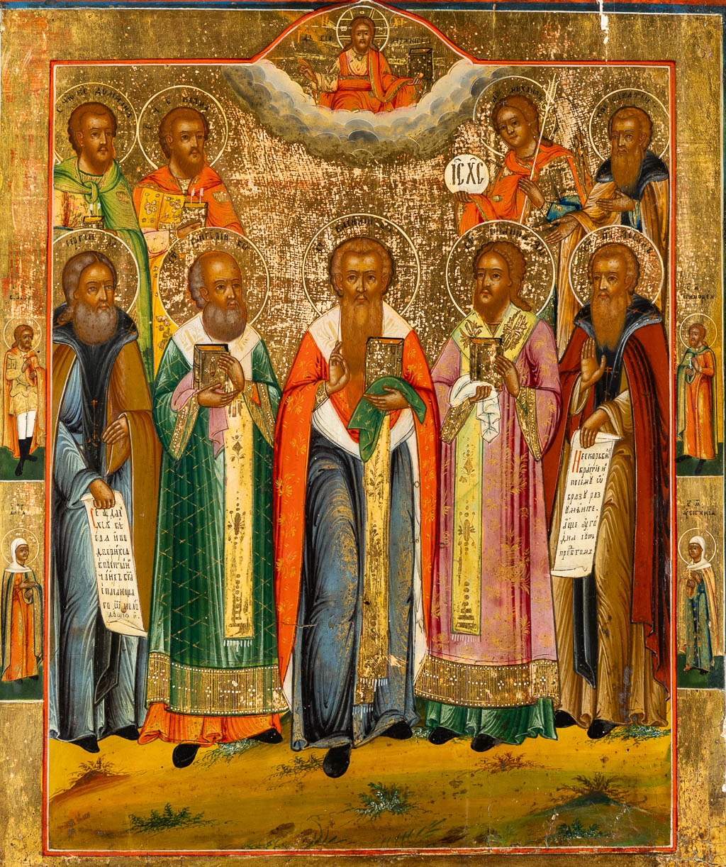 A fine and large Russian Family icon with depiction of Saints and Angels, 18th/19th C. (W:36,5 x H:44 cm)