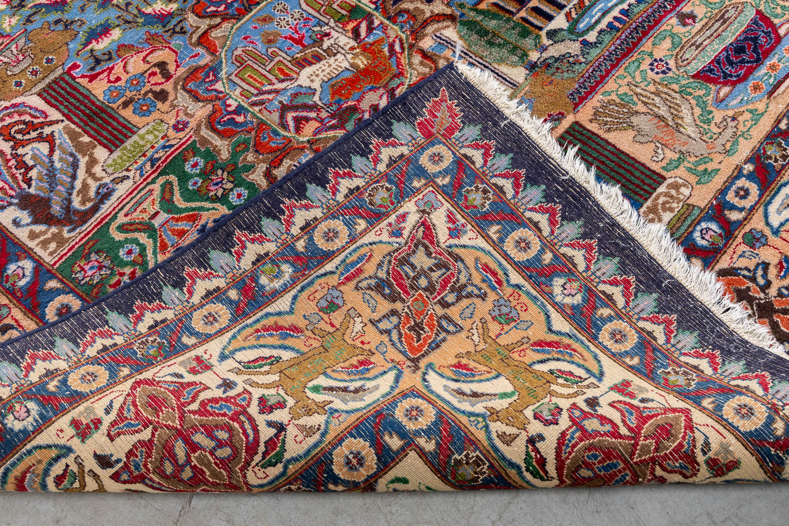 An Oriental hand-made carpet, Kashmar. (L:372 x W:305 cm)