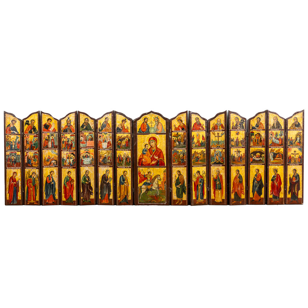 Een grote 'iconostase' met afbeeldingen van Orthodoxe feesten en een Kruisweg, 20ste eeuw. (W:201 x H:65 cm)