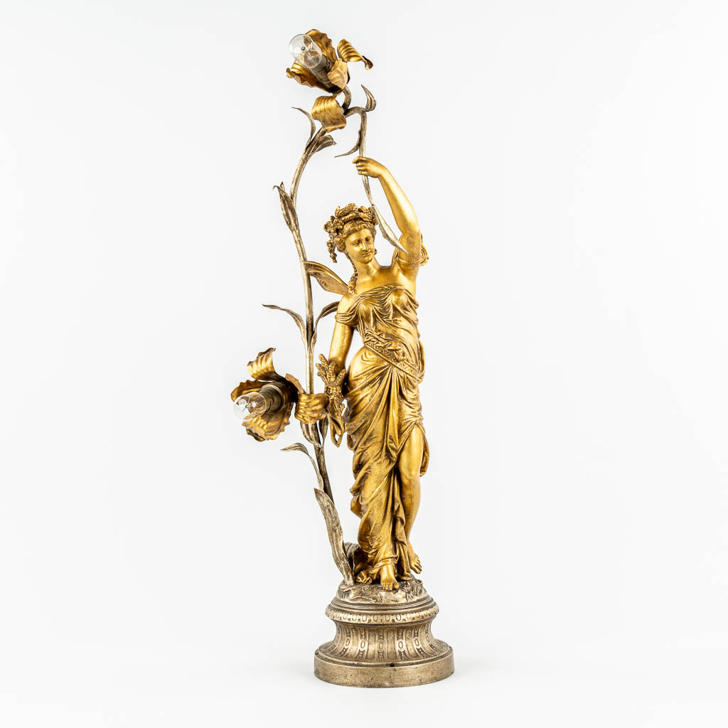 A table lamp with an Angel or Nimph, gilt spelter. (c.1900). 