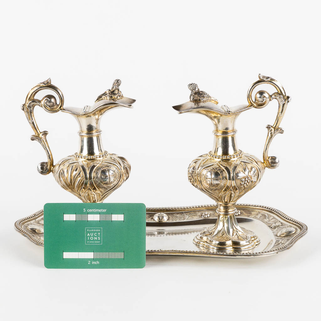 Joseph Dejean, Paris, a pair of wine and water cruets, silver, 1846-1865. 650g. (L:15 x W:26 x H:15 cm)