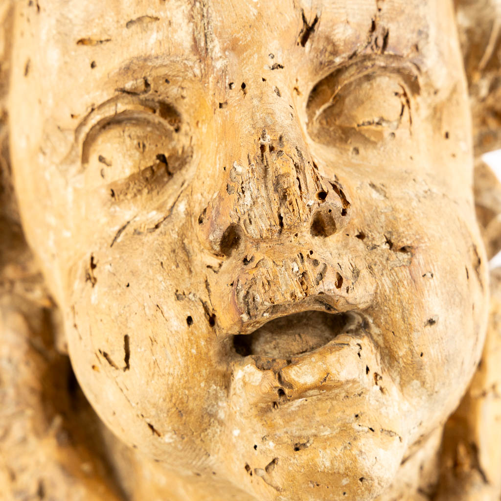 Head of an angel, an antique wood sculpture. 18th C. (L:18 x W:20 x H:30 cm)