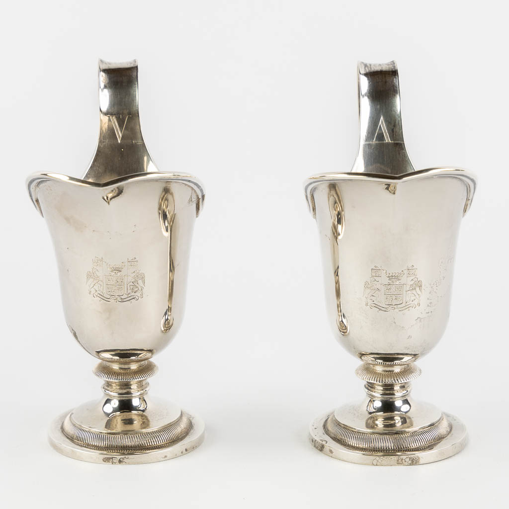 Phillipus MYS (1801-1881) 'Wine and water cruets', Bruges, Silver. 779g. (L:18,5 x W:26,5 x H:14 cm)