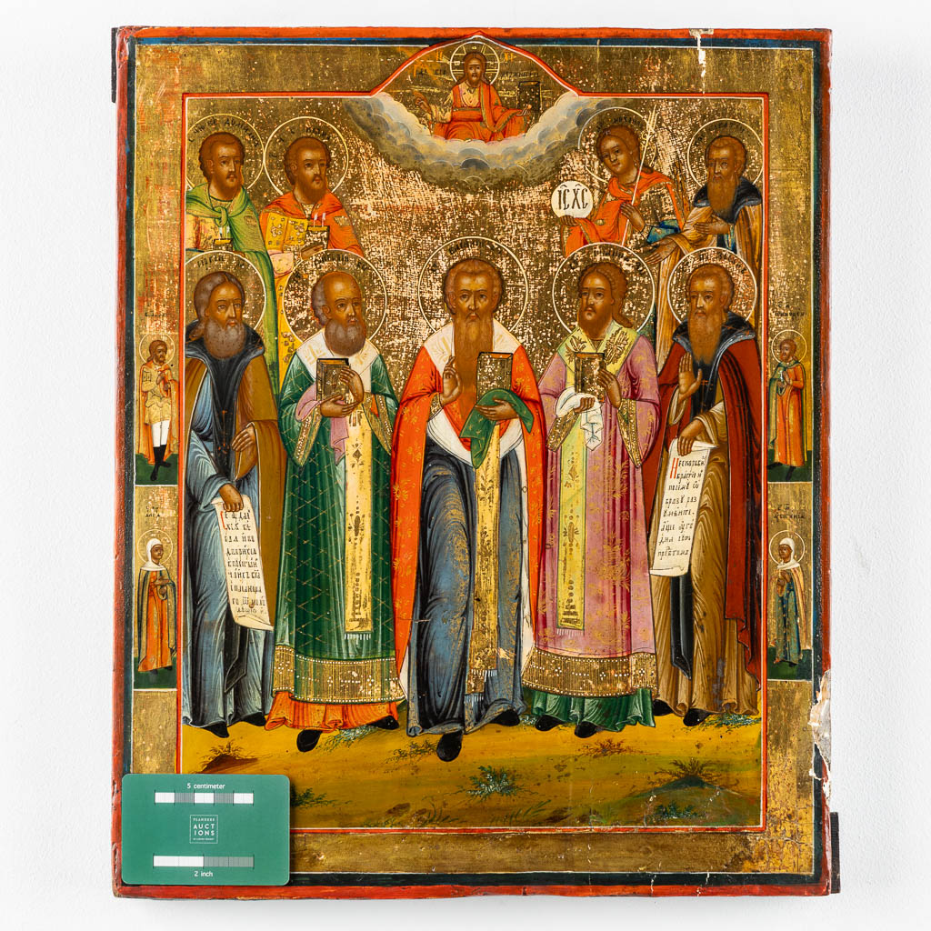 A fine and large Russian Family icon with depiction of Saints and Angels, 18th/19th C. (W:36,5 x H:44 cm)