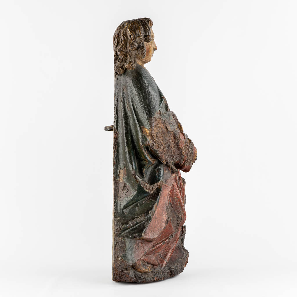 A large Gothic wood sculpture of an Angel, Rhineland, Germany, 14th/15th C.  (L:20 x W:36 x H:71 cm)