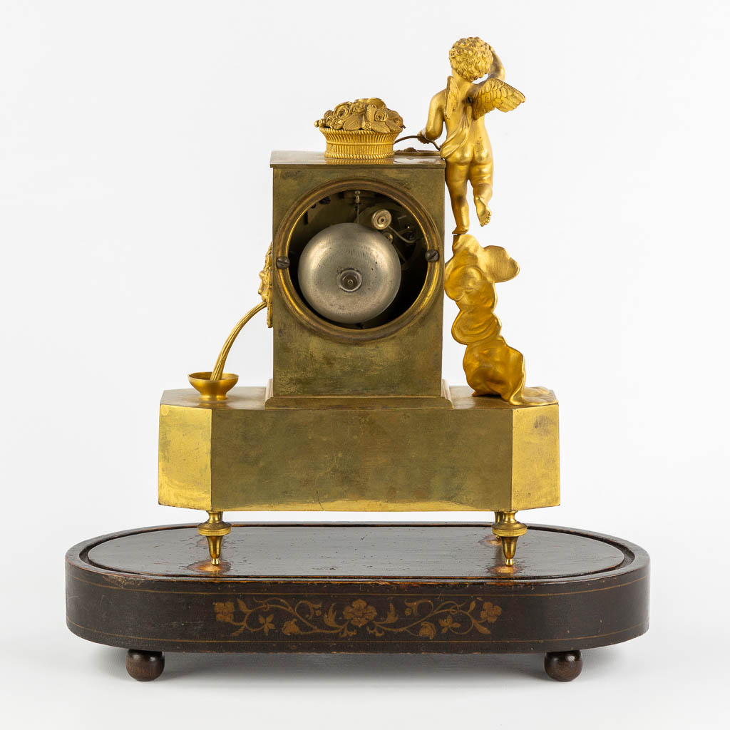 A mantle clock, Gilt bronze, Empire, 