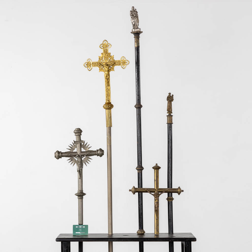 Three Processional crucifixes and two Processional staffs, Bronze and brass. Gothic Revival. (H:172 cm)