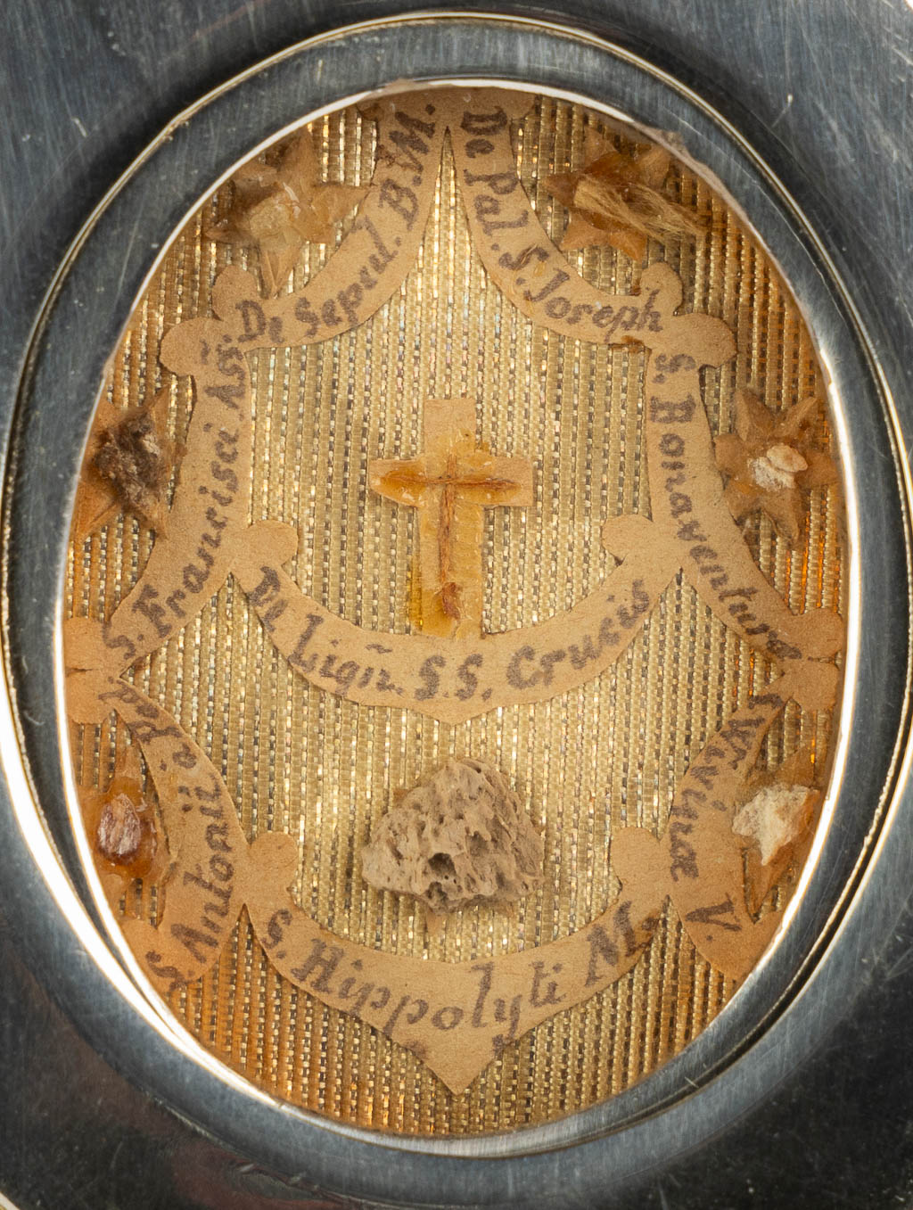 A sunburst monstrance with a multi-theca 