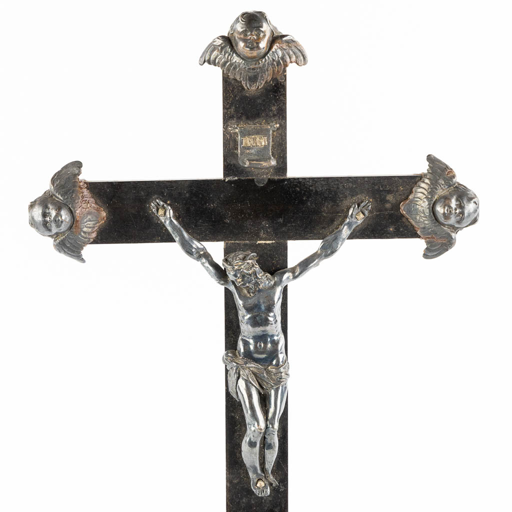 An ebonised wood Reliquary crucifix, 7 relics, mounted with silver. 19th C. (W:17 x H:50 cm)