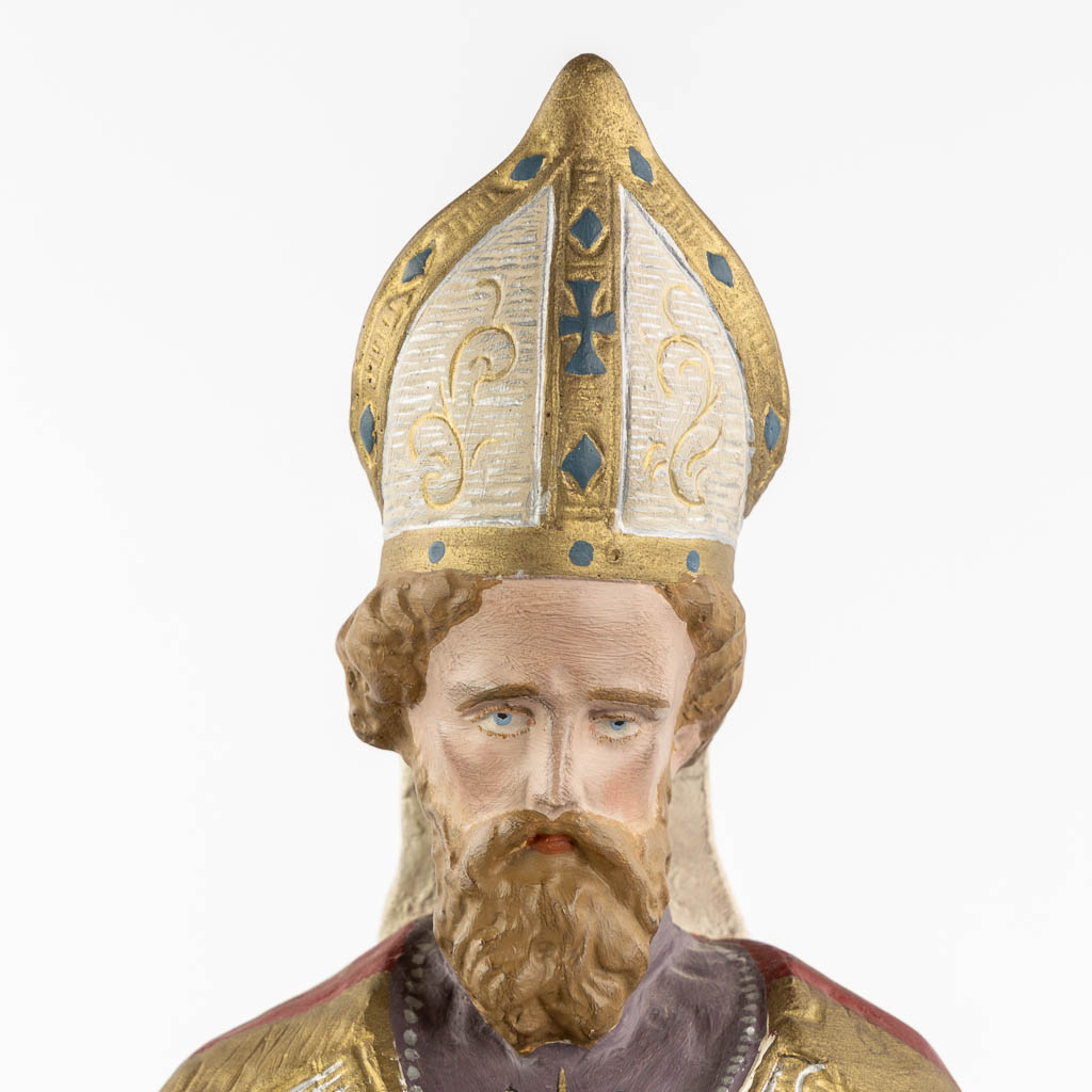 Saint Eligius, polychrome plaster. (W:19 x H:52 cm)