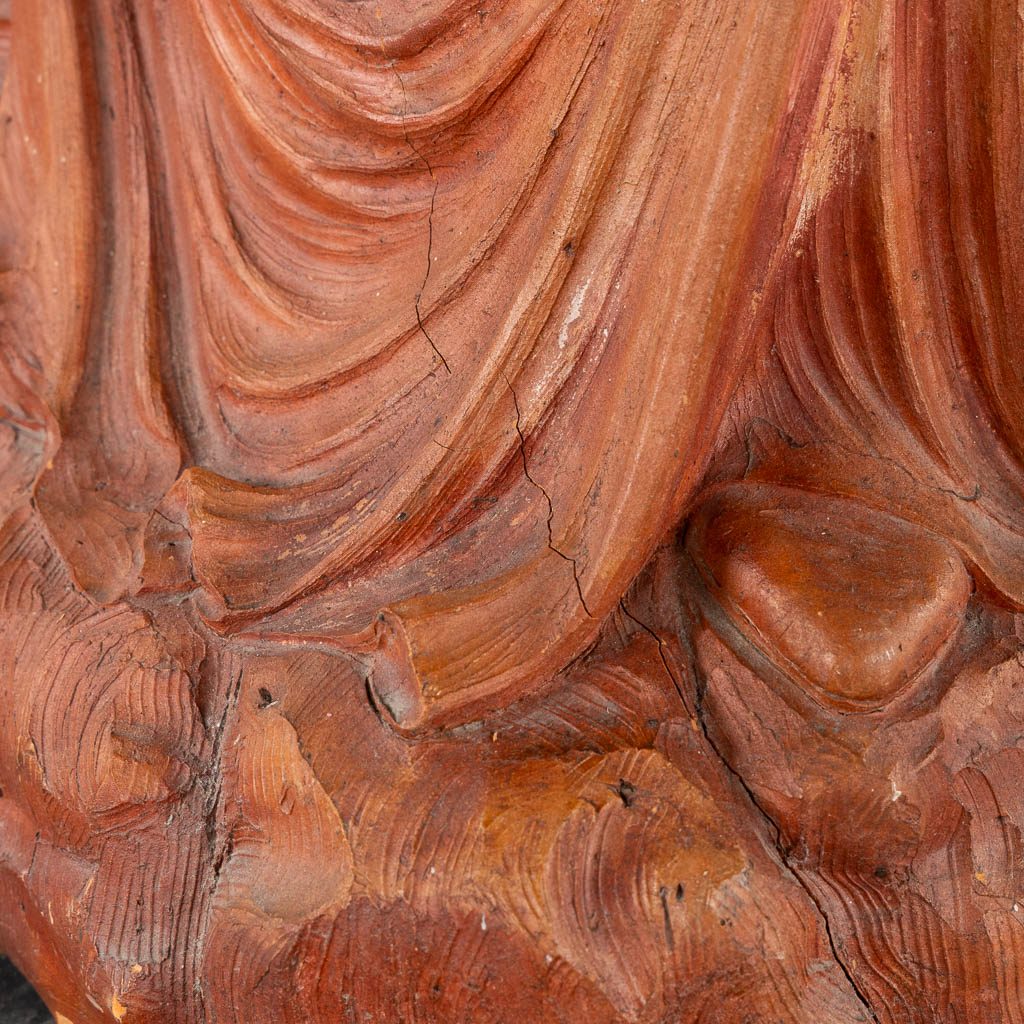 A large, red patinated terracotta Piëta.