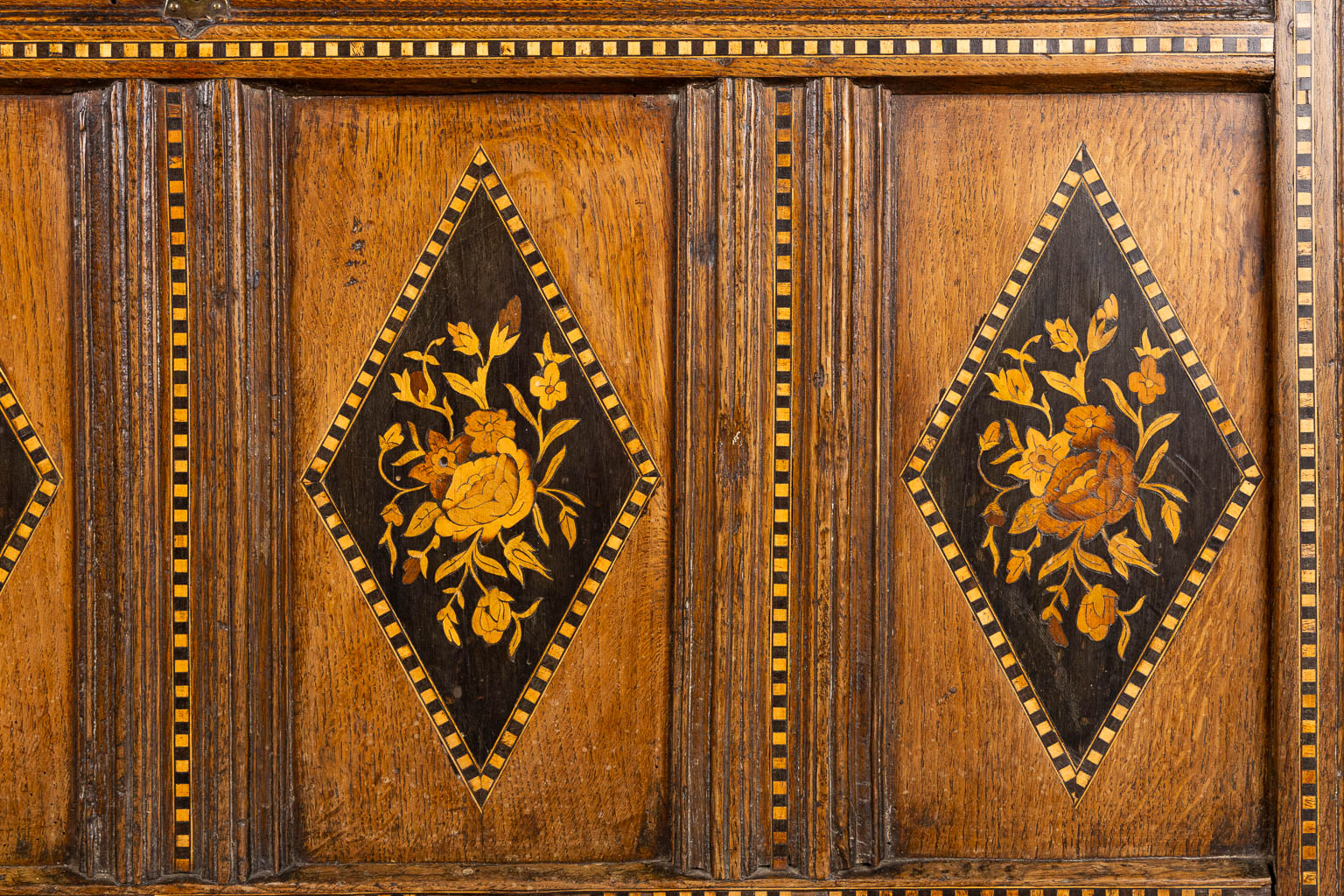 An antique chest with floral marquetry inlay, 18th C. (L:53 x W:124 x H:64 cm)