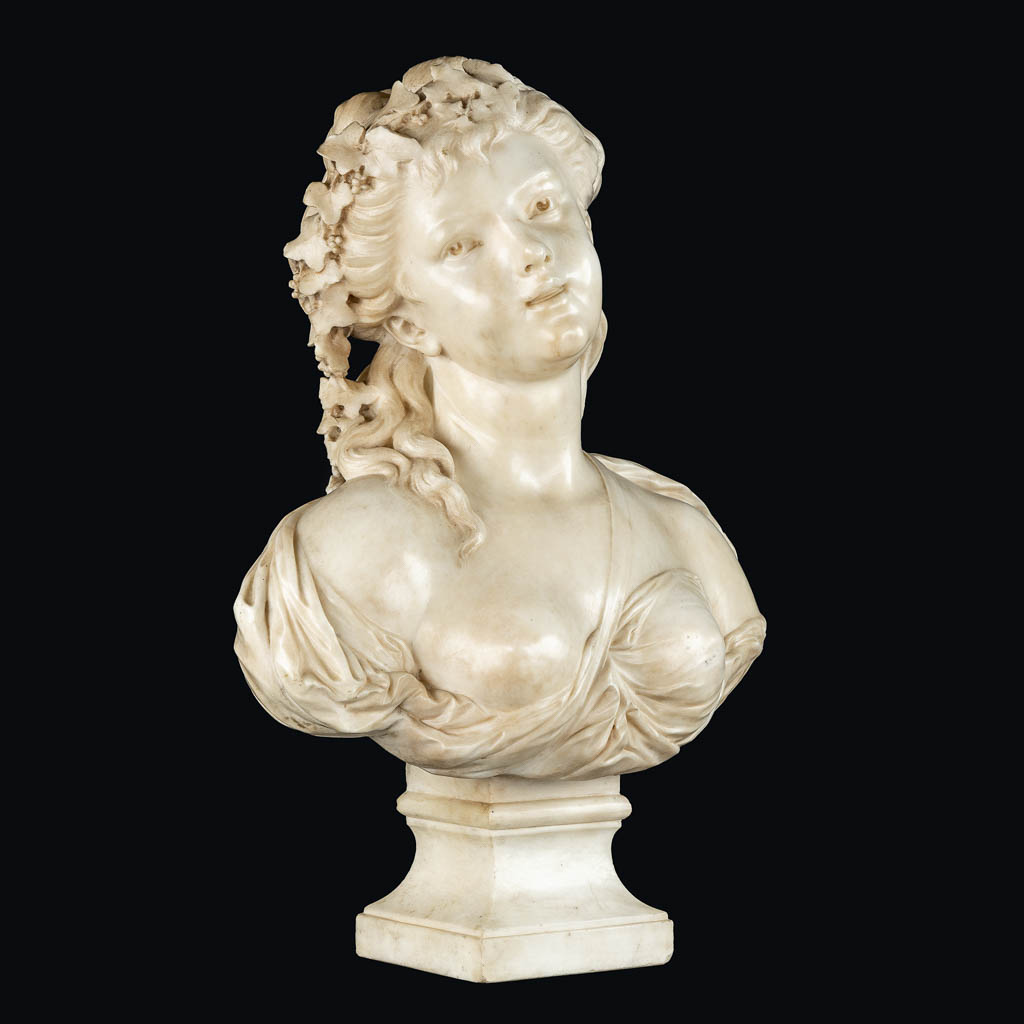 An elegant bust of a half-naked lady, sculptured marble. 19th C. (L:26 x W:45 x H:64 cm)