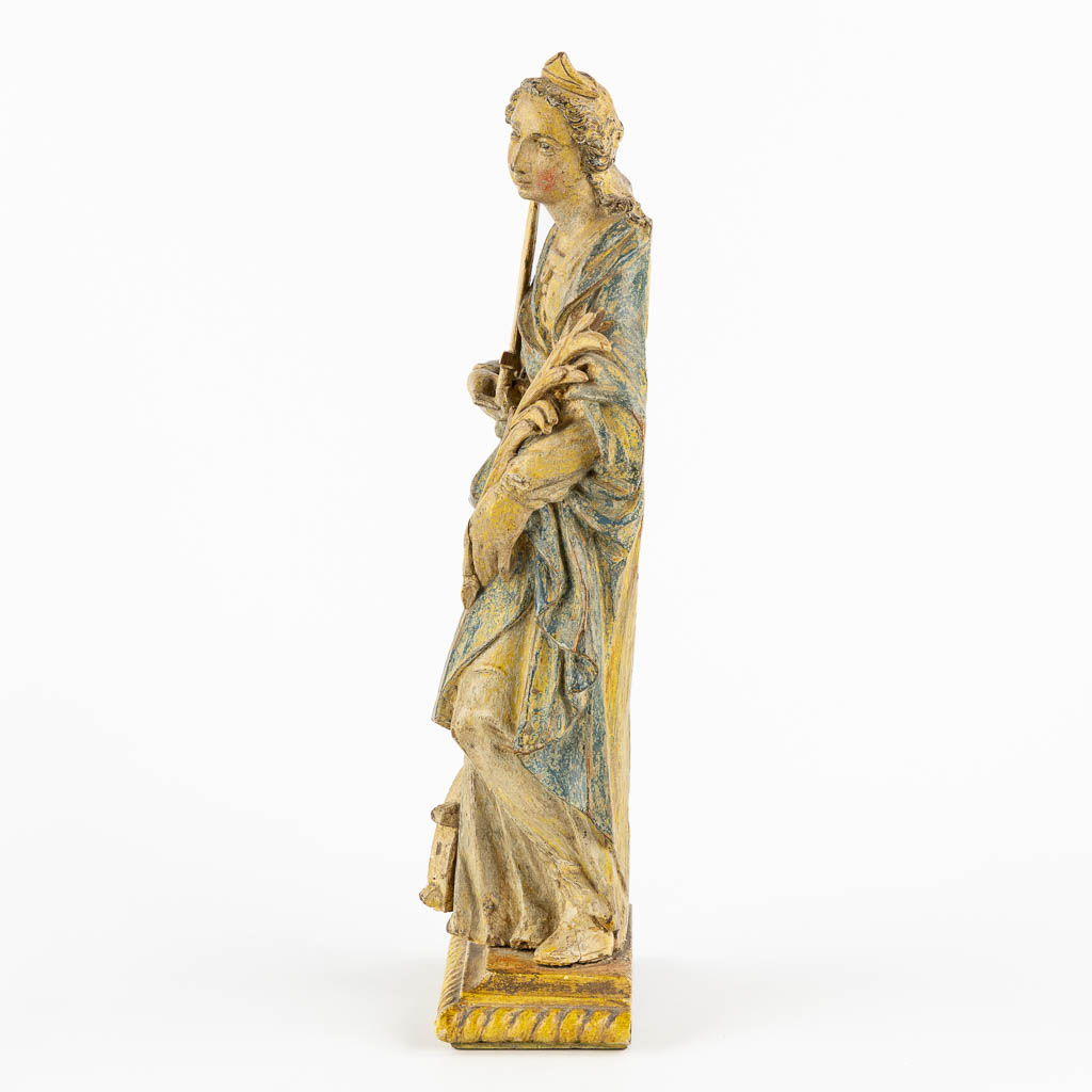 Saint Catherine, an antique wood sculpture, probably 18th C. (L:8 x W:13 x H:32 cm)