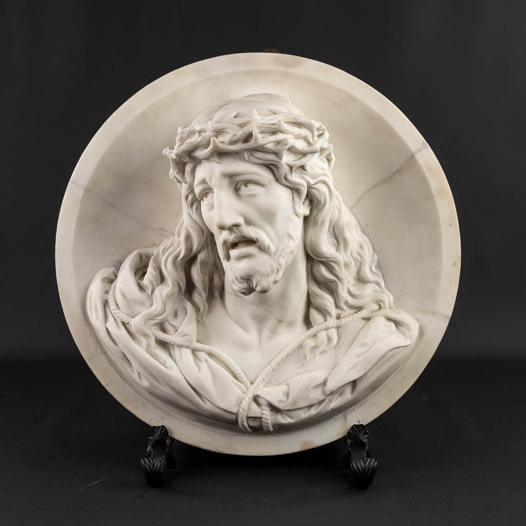 An exceptional medaillion 'The Head Of Christ', sculptured Carrara marble. Signed Piazza. (L:20 x D:54 cm)