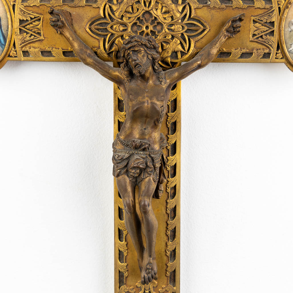 A crucifix, finely chiselled brass with 4 miniature paintings of 'The Four Evanglists'. 