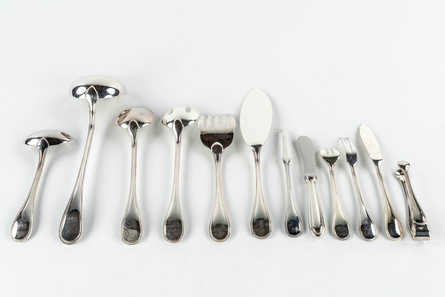 Christofle 'Perles' a 142-piece silver-plated cutlery in a Christofle chest with drawers. 