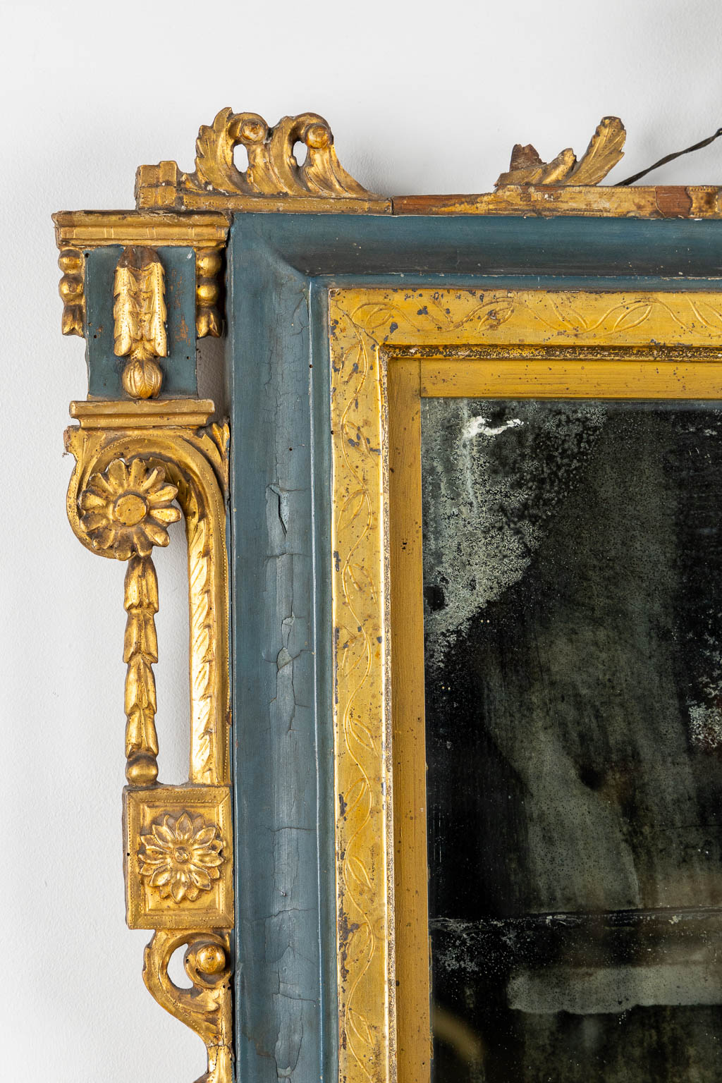 An antique mirror, gilt and patinated wood, late 18th, early 19th C. (W:84 x H:114 cm)