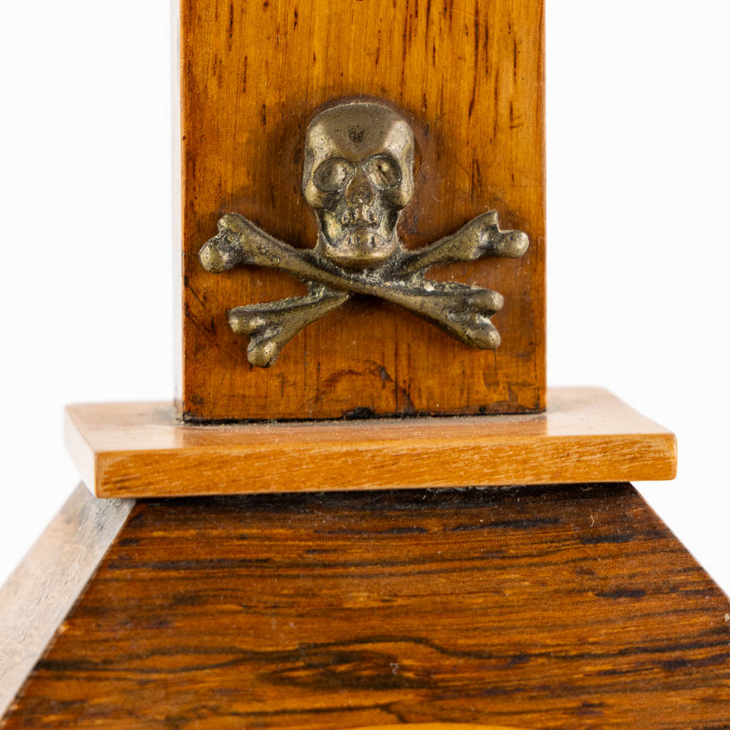 A bronze Corpus Christi mounted on a mahogany and marquetry inlay crucifix.