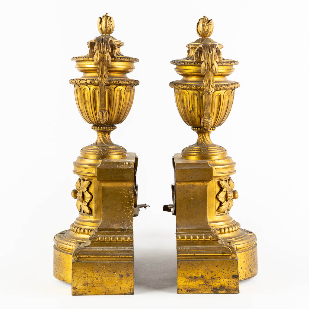 A fine pair of gilt bronze fireplace bucks, Louis XVI style. 19th C.