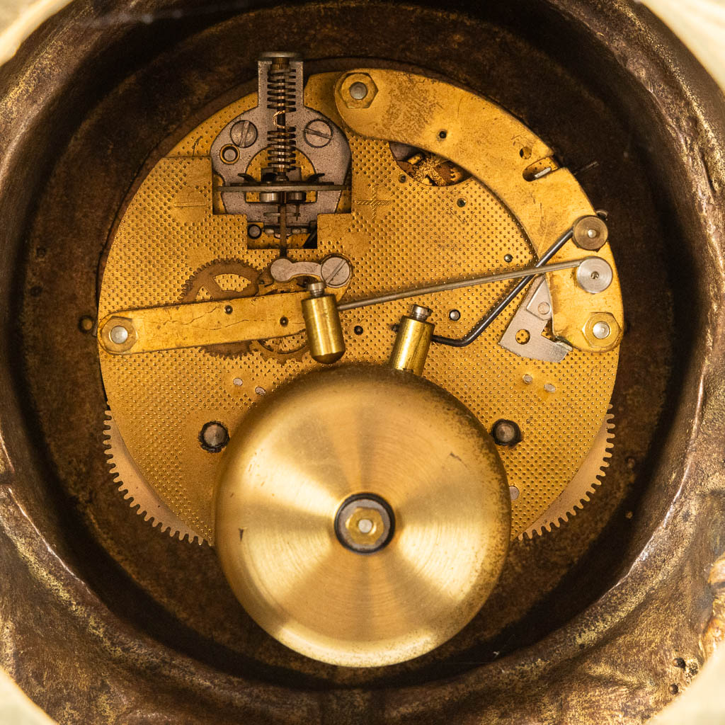 A large three-piece mantle garniture clock, polished bronze. Circa 1970.