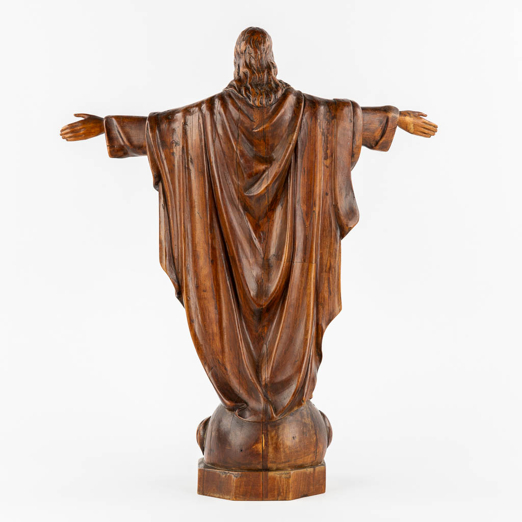 An antique wood sculpture of 'Jesus Christ The Redeemer'.