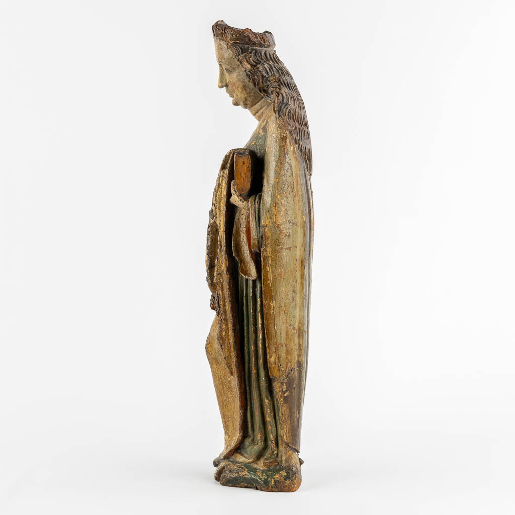 Saint Ursula, princess of Bretagne, a wood sculpture, Rhineland, Late 14th C. (L:13 x W:17 x H:58 cm)