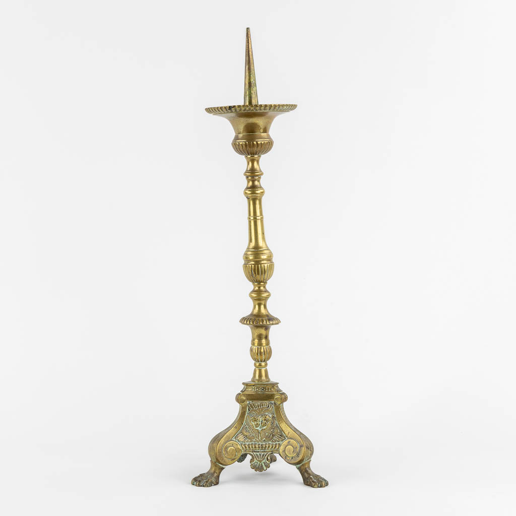 An antique candlestick, finished with putti, 18th C. (H:54 cm)