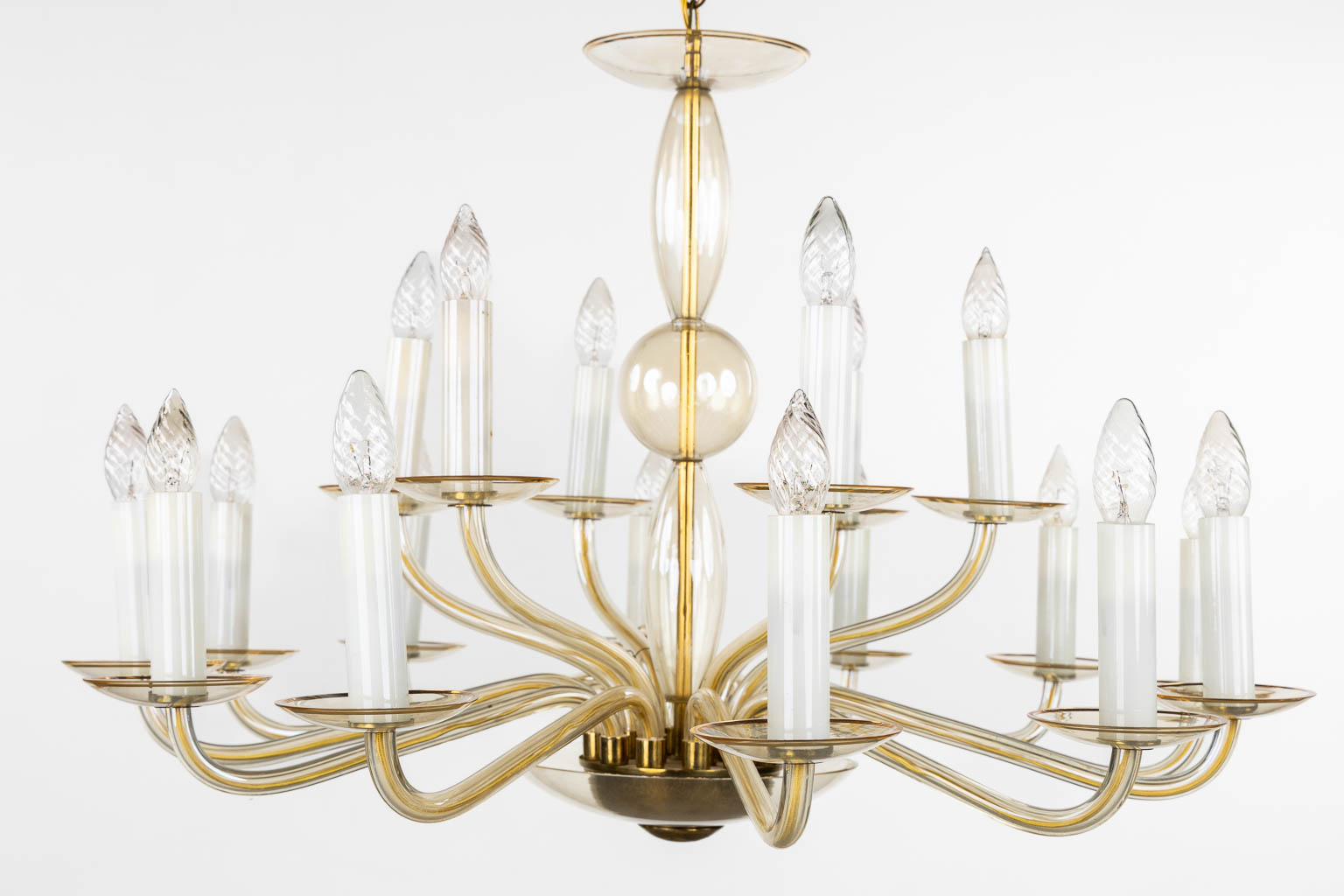 A Bohemian tinted glass chandelier, 18 points of light. (H:65 x D:89 cm)