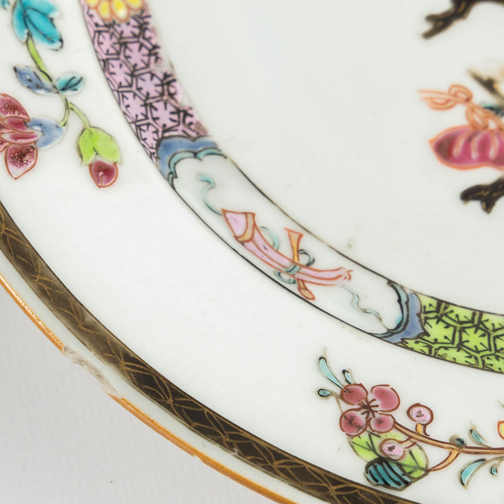 Five Chinese Famille Rose plates with blossoms and flowers. (D:23 cm)