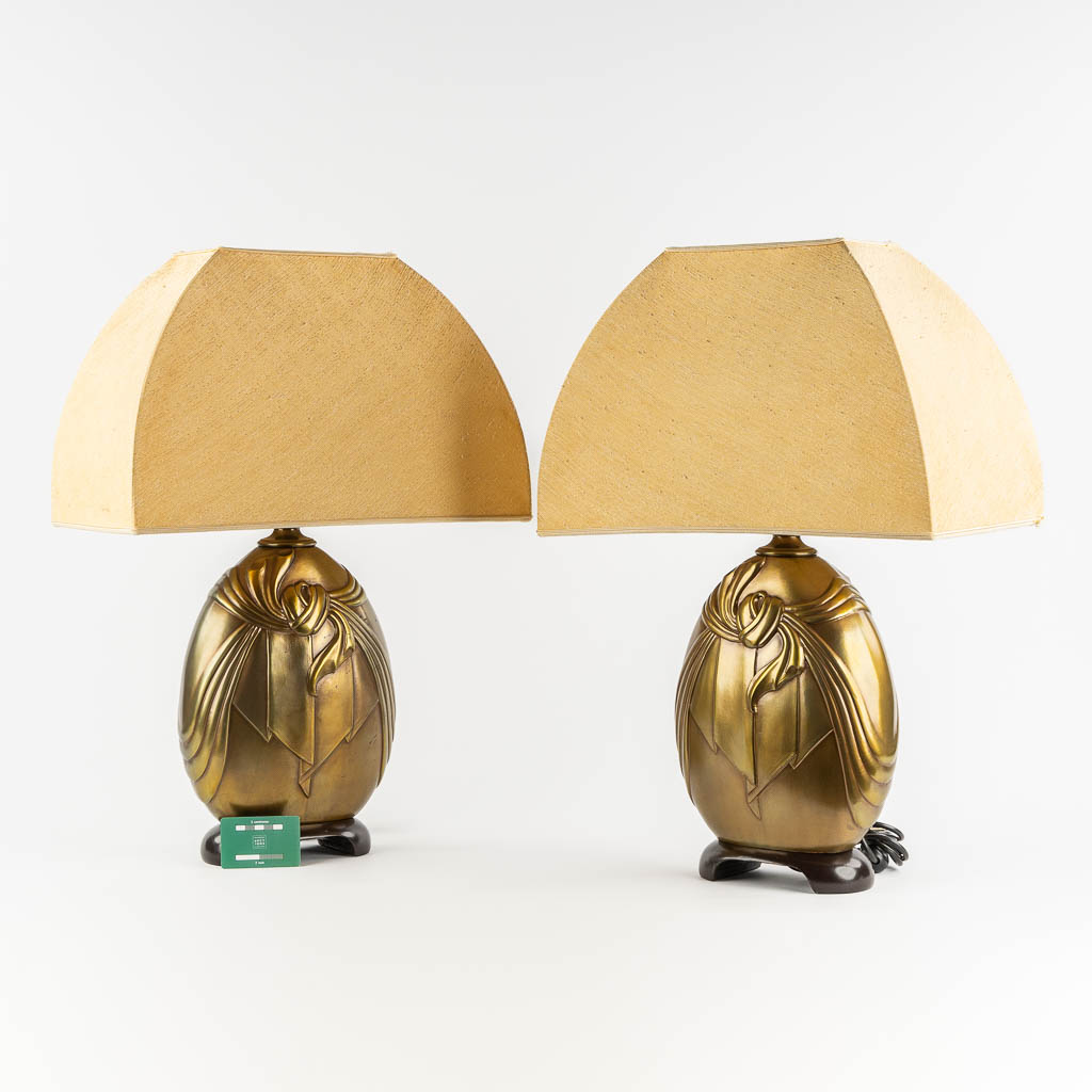 Deknudt, a pair of table lamps. Hollywood Regency style. (L:13 x W:23 x H:43 cm)