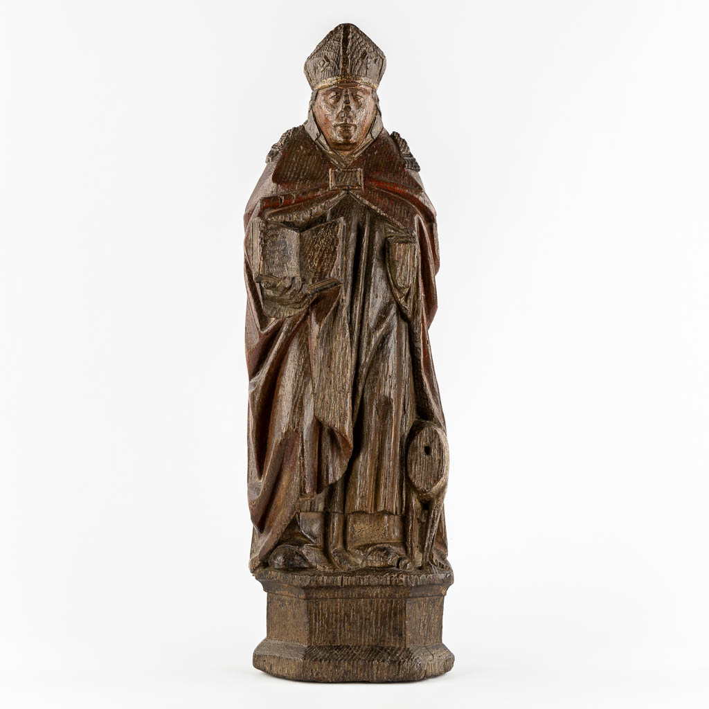 An antique wood-sculptured figurine of Saint Hubert of Liège, 17th/18th C.