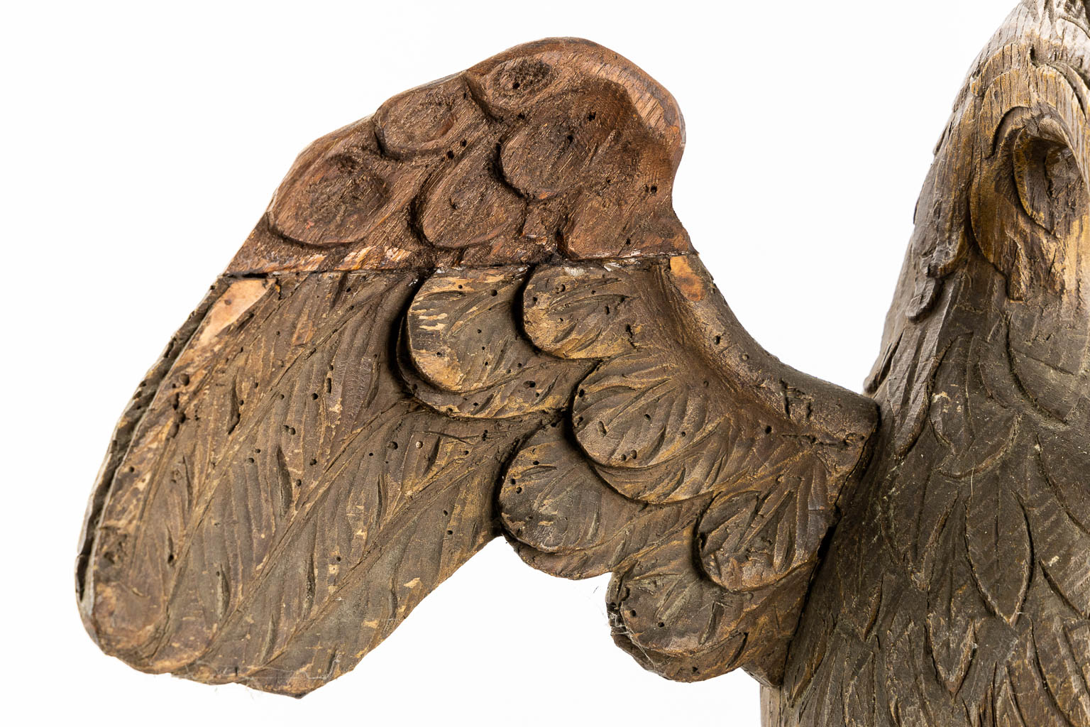 An antique wood-sculptured 'Pelican With Chicks'. 18th/19th C.