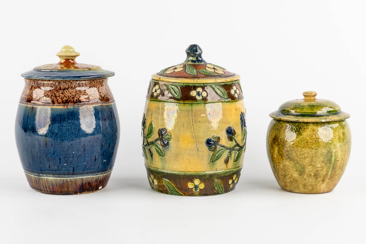 Three Flemish Earthenware Tobacco Jars. (H:20 x D:15 cm)