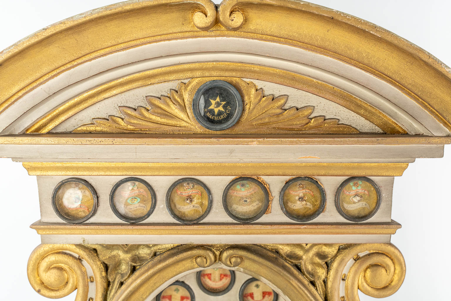 A pair of large reliquary cabinets with 95 theca, of which 65 have documents. Neoclassical style, 19th C.