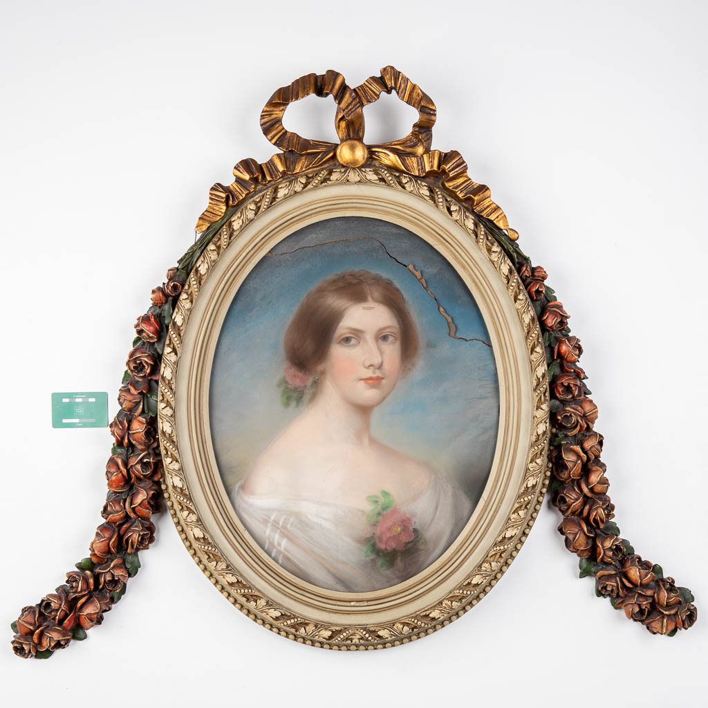 An antique frame with a portrait, wood sculptured in Louis XVI style. Portrait of a lady, gouache on paper. (W:107 x H:86 cm)