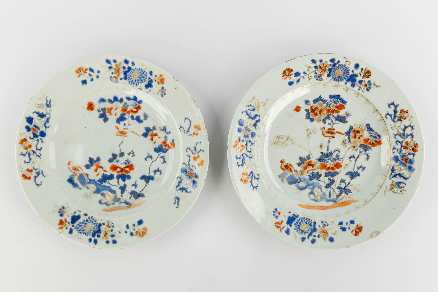 Twelve Chinese Famille Rose and Blue-white plates and bowls. 19th/20th C. (D:29 cm)