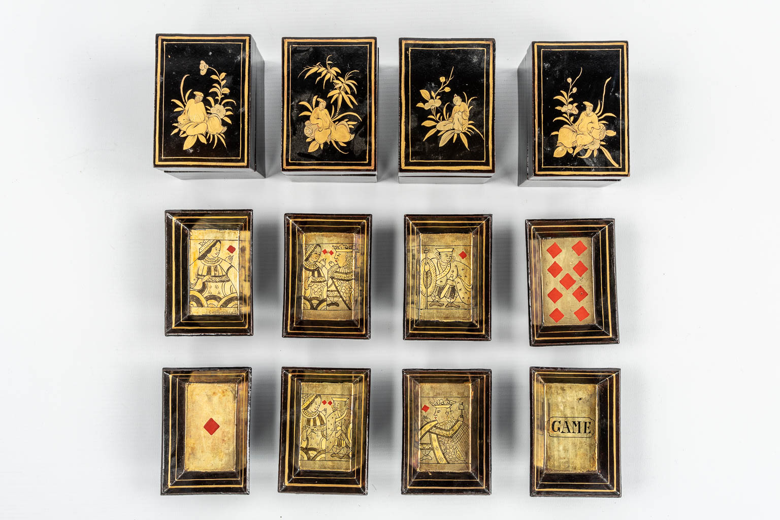 A Chinese Canton export game box, lacquered with hand-painted decors. 