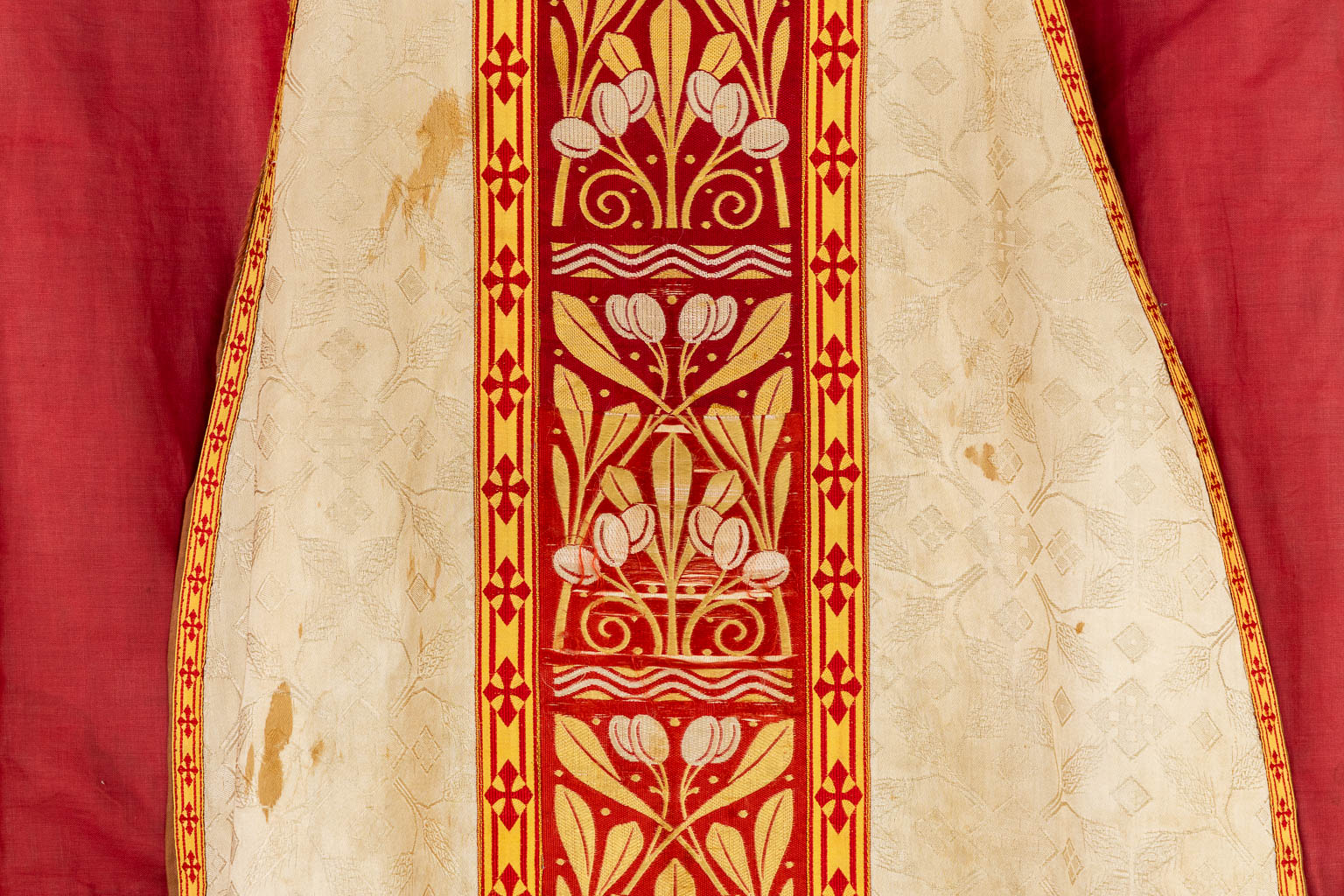 A cope, Humeral veil and Roman Chasuble, embroideries with images of fish and bread, The Holy Spirit. 