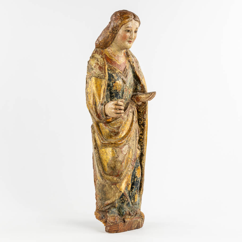 An antique wood sculptured figurine of a saint, polychrome, 14th C. (W:27 x H:78 cm)