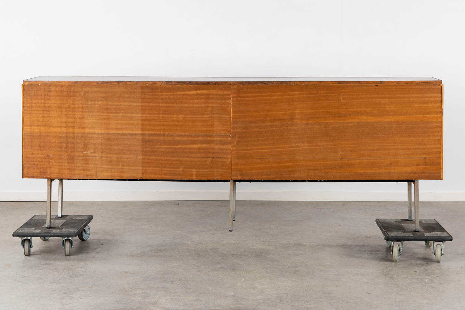 A mid-century sideboard, veneer and chomed metal. By Roger De Winter. (L:46 x W:237 x H:84 cm)