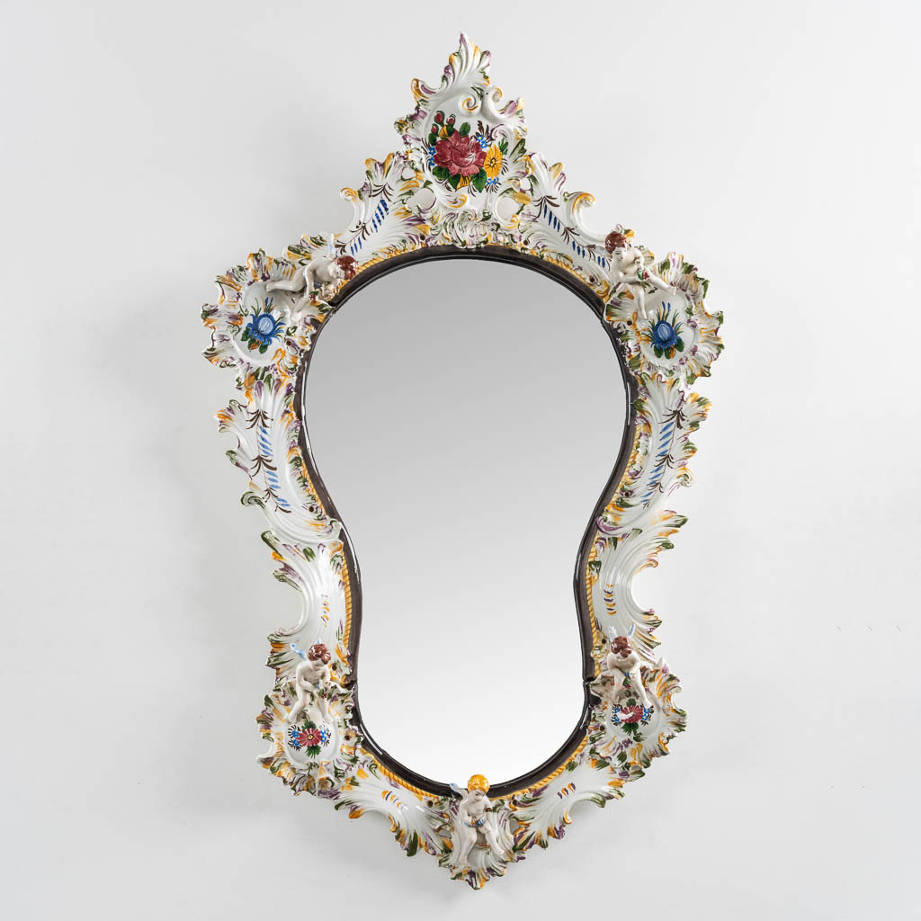 Capodimonte, a large mirror with porcelain rim. 20th C. (W:67 x H:110 cm)