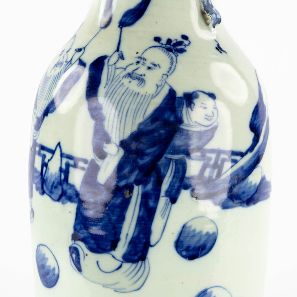 A Chinese vase, blue-white decor with wise men and children. (H:56,5 x D:21 cm)