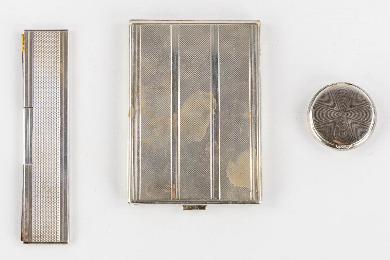 Wolfers, a silver jewellery or Cigar box, added are some silver objects. (L:8 x W:16 x H:6 cm)