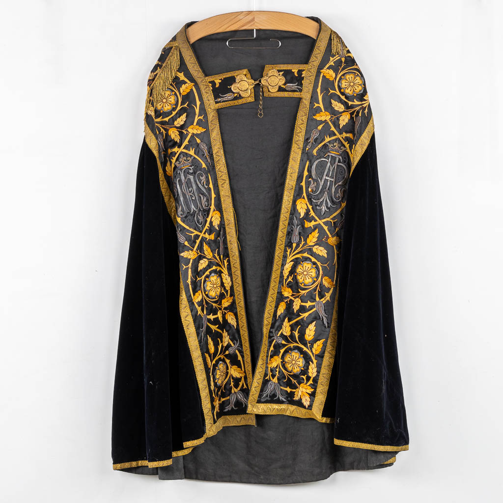 A Cope, Roman Chasuble and Two Dalmatics, stola and maniple. Thick gold and silver brocade emboideries. 